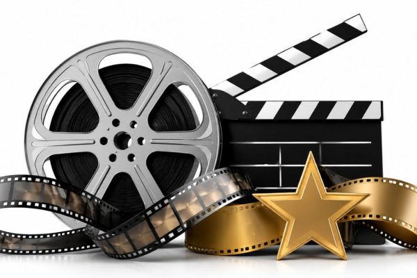 Alpha movie inspired editorial illustration featuring film reel, clapperboard and cinematic spy-themed Bollywood visuals on white background